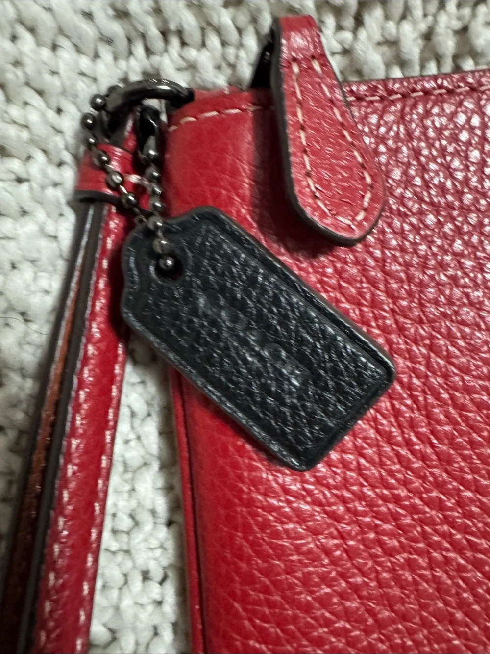 Coach Red Pebbled Leather Wristlet with Floral Emboss